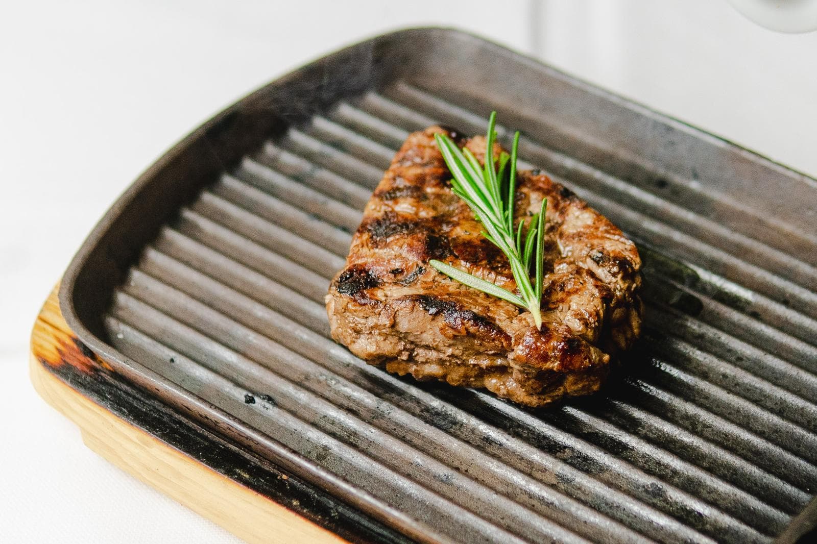 Grilled steak with rosemary