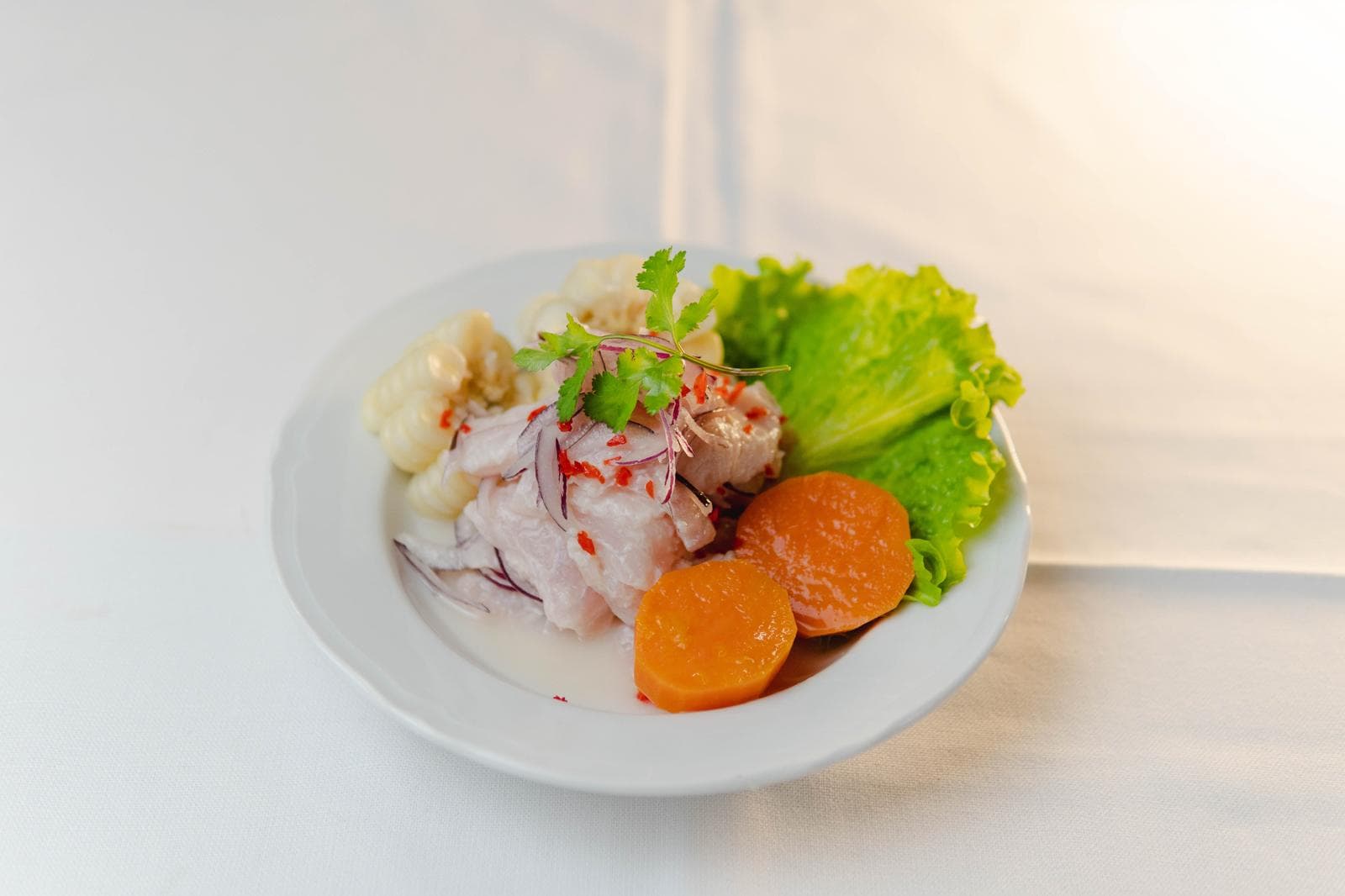 Fish ceviche with sweet potato and lettuce