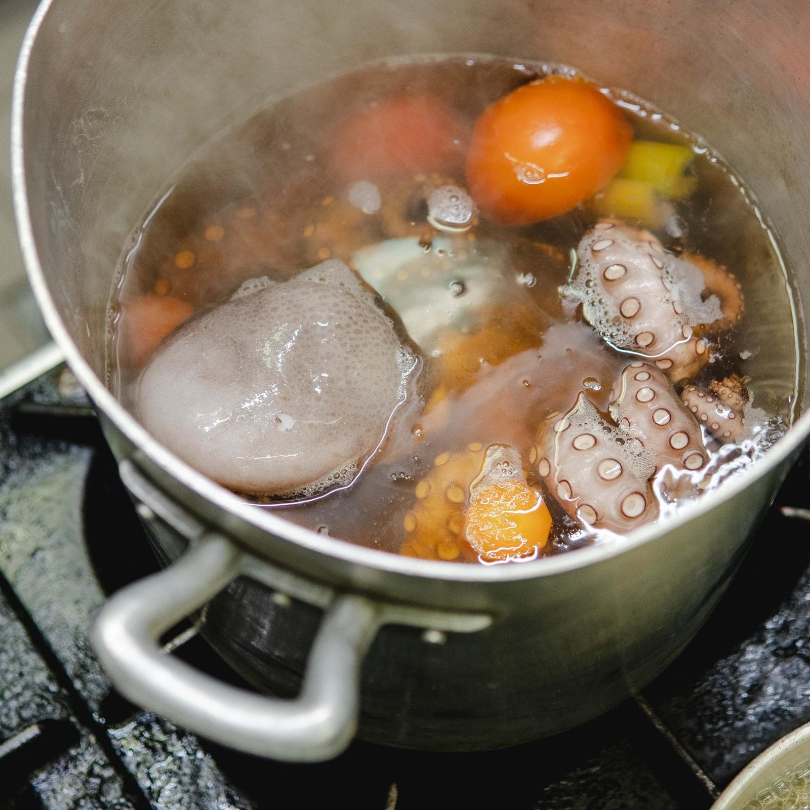 Octopus simmering with vegetables