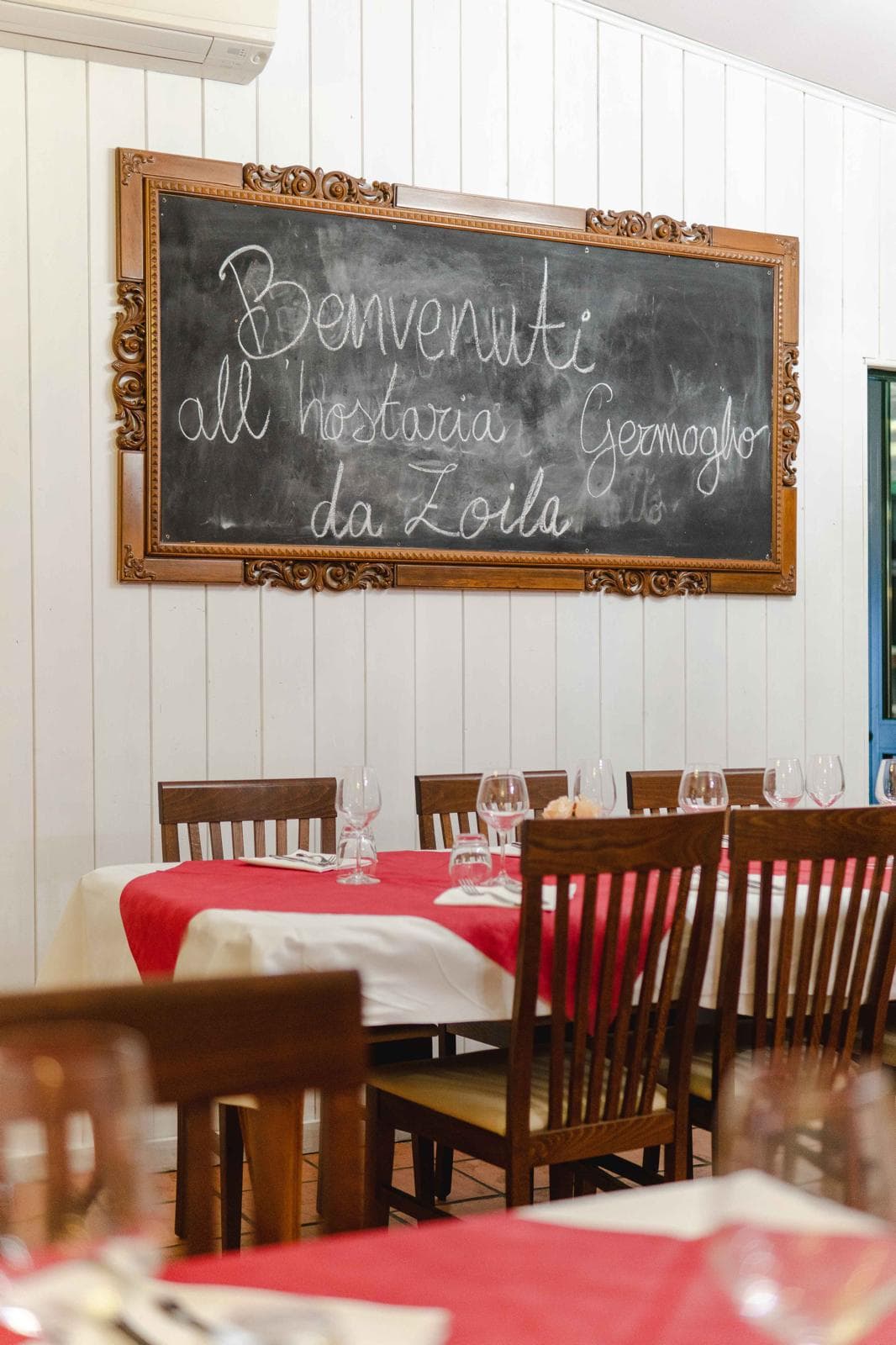 The dining room with the welcome chalkboard